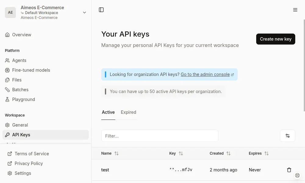 The image displays a web interface for managing API keys. It shows a sidebar with navigation, where "API Keys" is selected. The main content area is titled "Your API keys," providing options to create new keys, filter existing ones, and view a list of personal API keys with their names, masked keys, creation dates, and expiration status. There's also information about organization API keys and the limit of 50 active keys per organization.