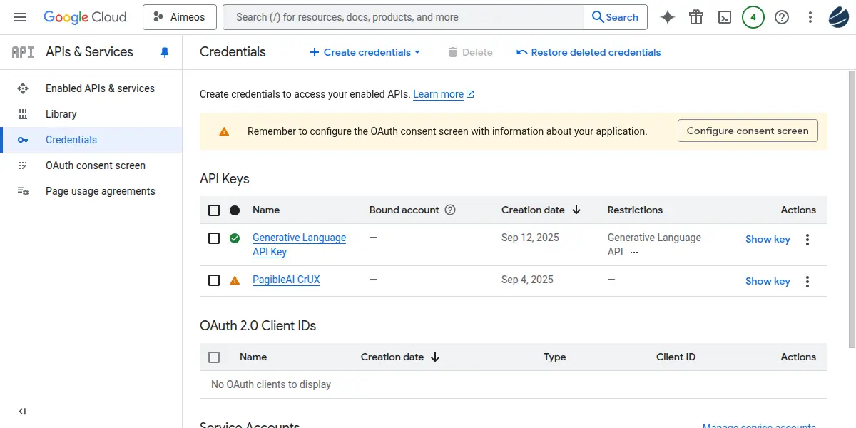 Google Cloud Platform API & Services Credentials management page, displaying API keys, an OAuth consent screen configuration reminder, and no OAuth 2.0 client IDs.
